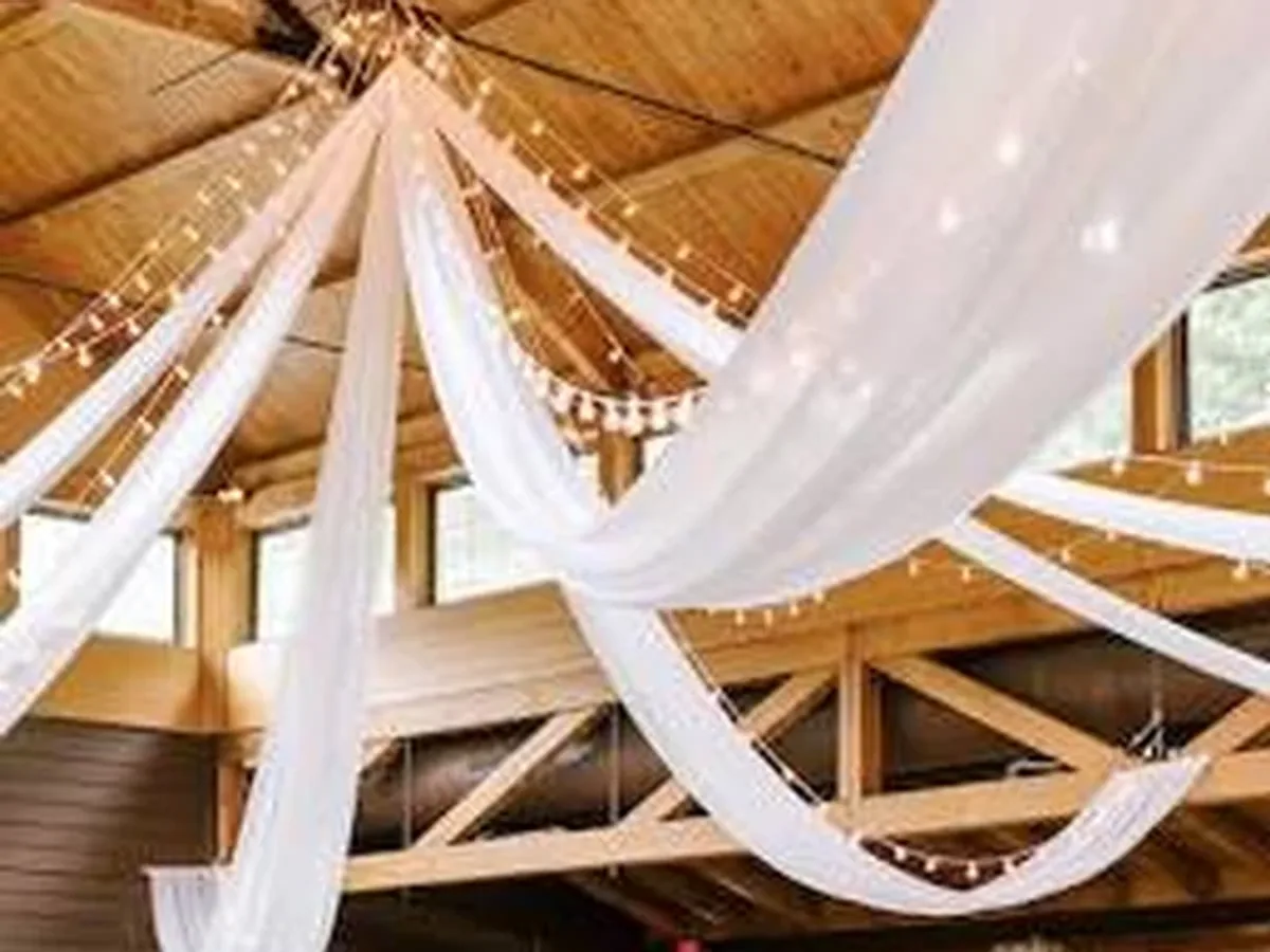 Warm reception setting prepared for the Santos–Reyes wedding celebration