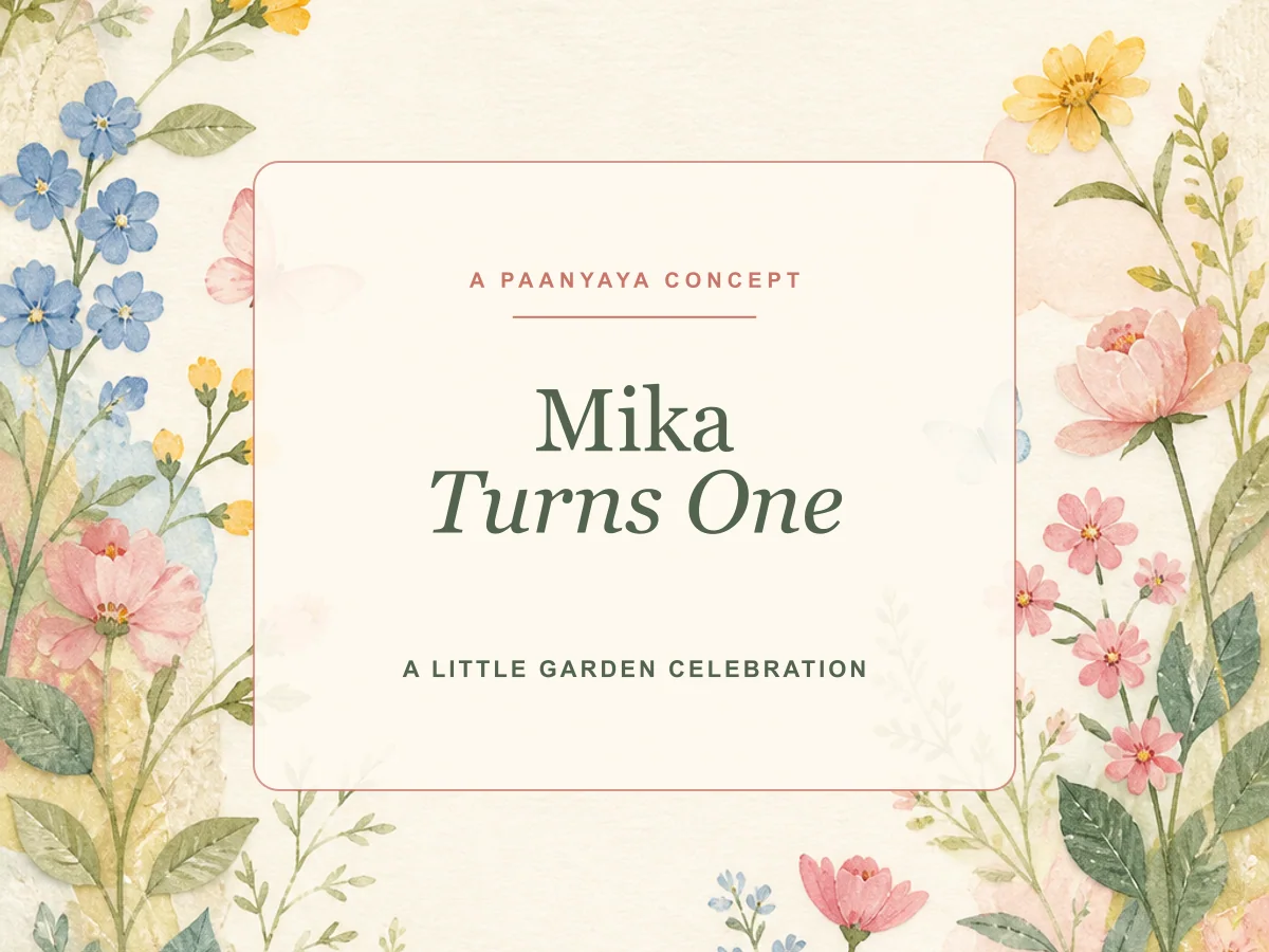 First-birthday invitation concept with watercolor garden flowers, butterflies, and soft clouds